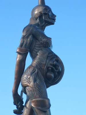 Damien Hirst sculpture of pregnant woman called Verity on Ilfracombe harbour side