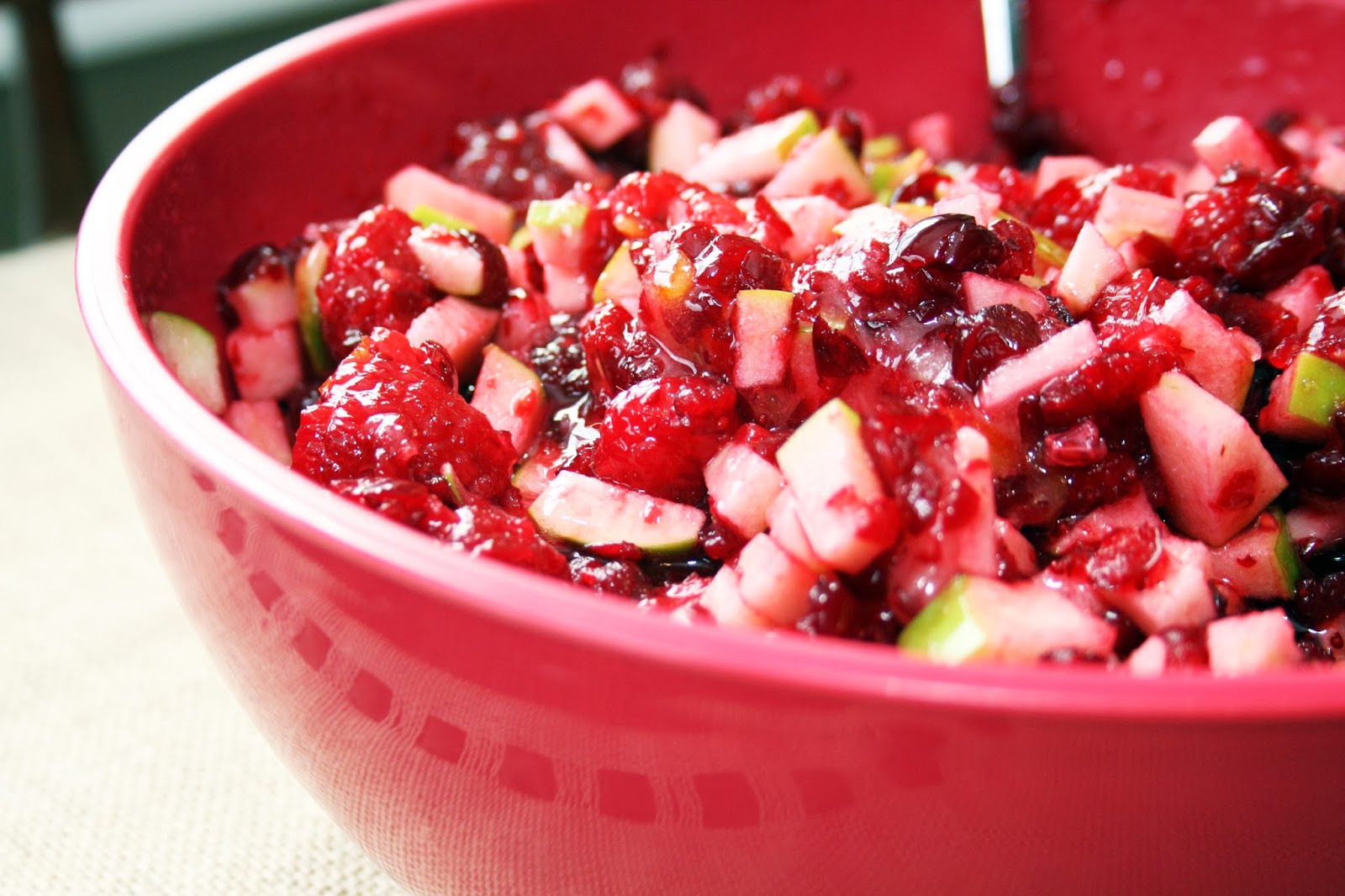 This cranberry orange relish recipe is chunky thanks to golden raisins, wal...