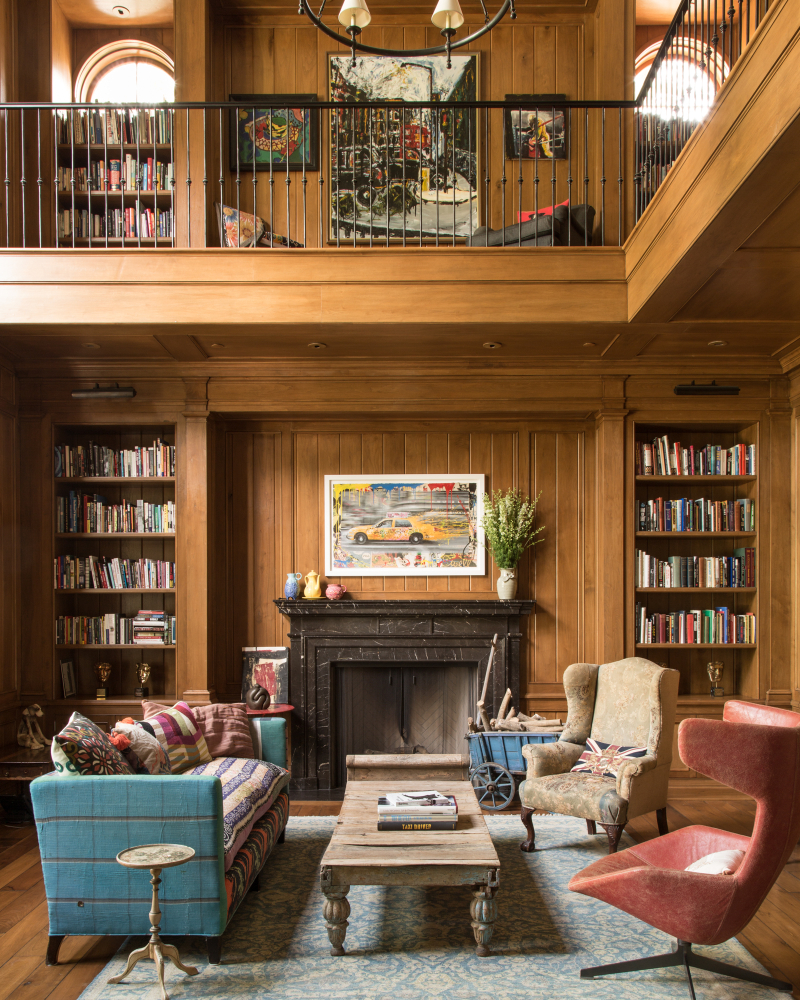 Walnut library in Giannetti designed home Walnut panelling in library with fireplace and eclectic decor by Samantha O'Connor