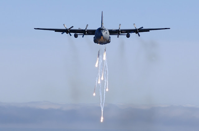 MC-130 aircraft dropping moab