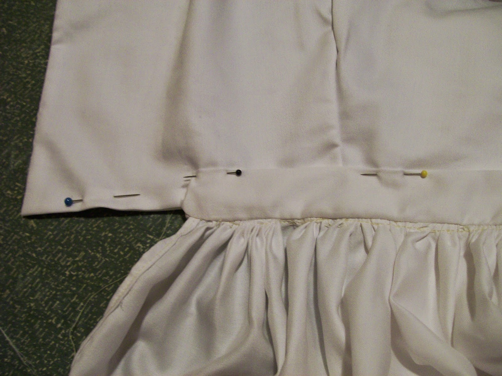 Finishing the bodice placket. Finishing the bodice placket.