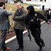 Van strikes security barrier near White House, armed driver apprehended