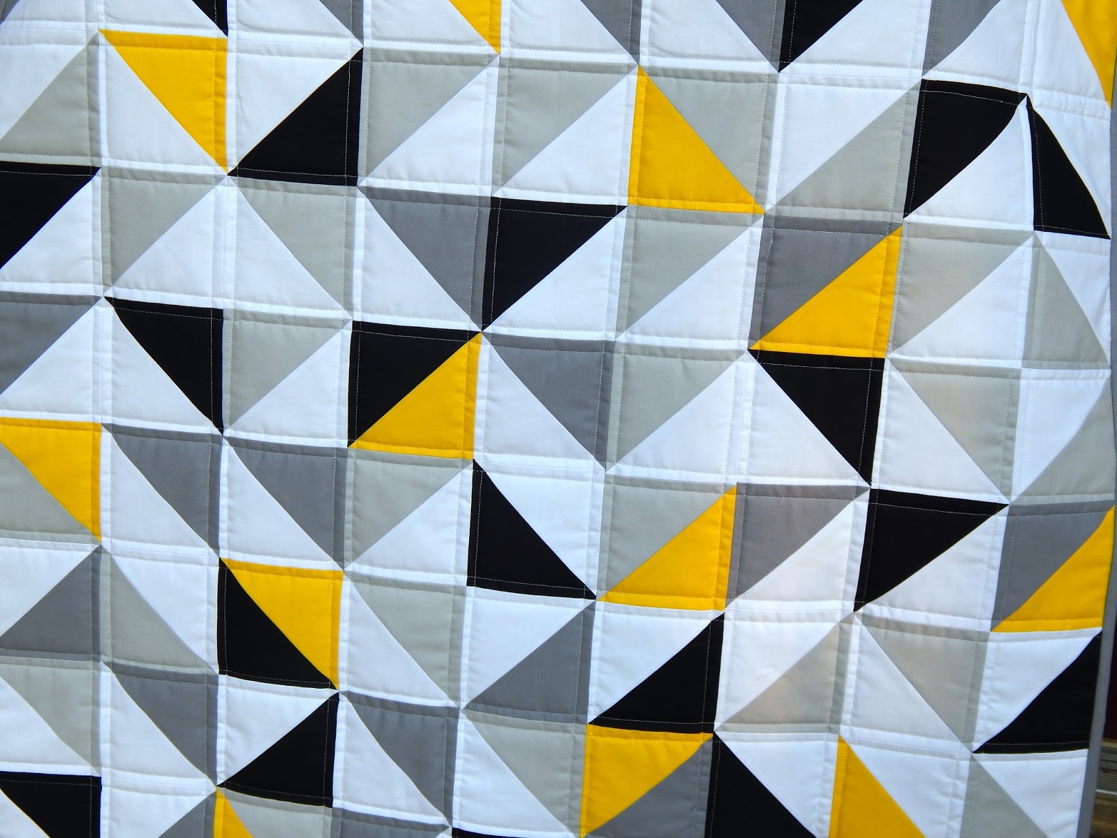 The Fleming's Nine Modern Baby Quilt in Solids