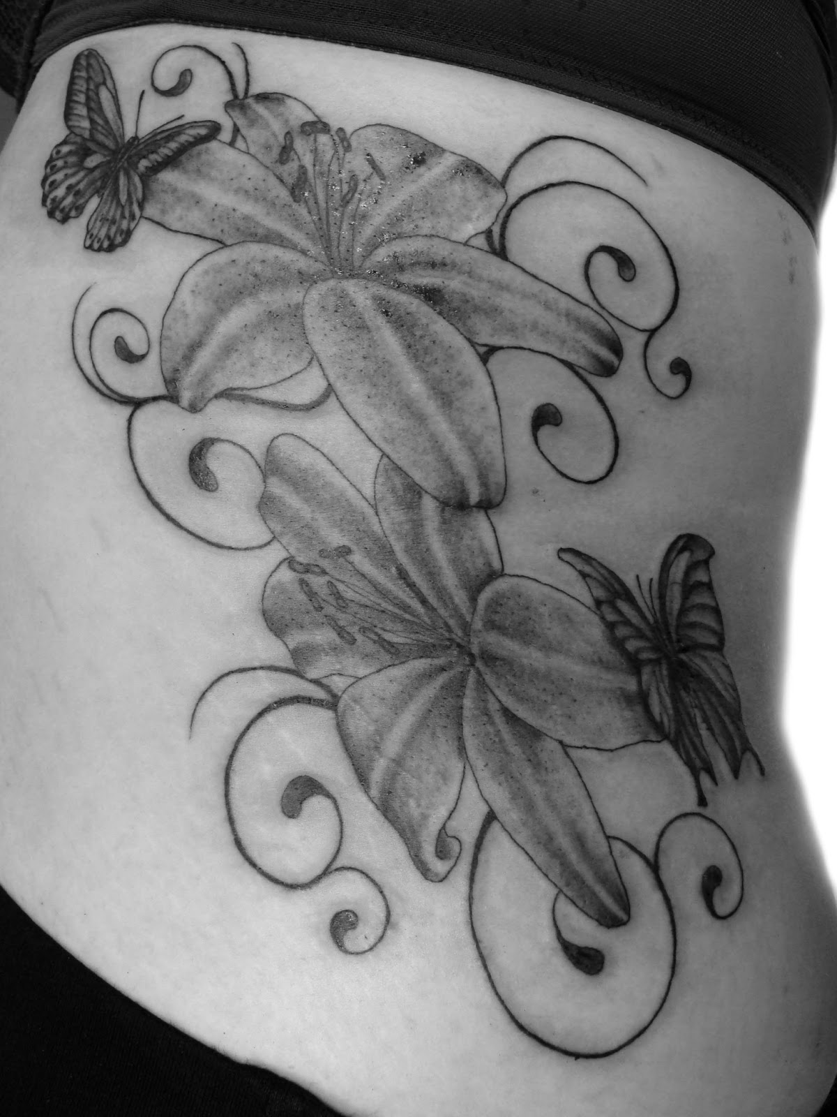 Tattoos by Nic . Nicola HanleyCarter lily and butterflies tattoo