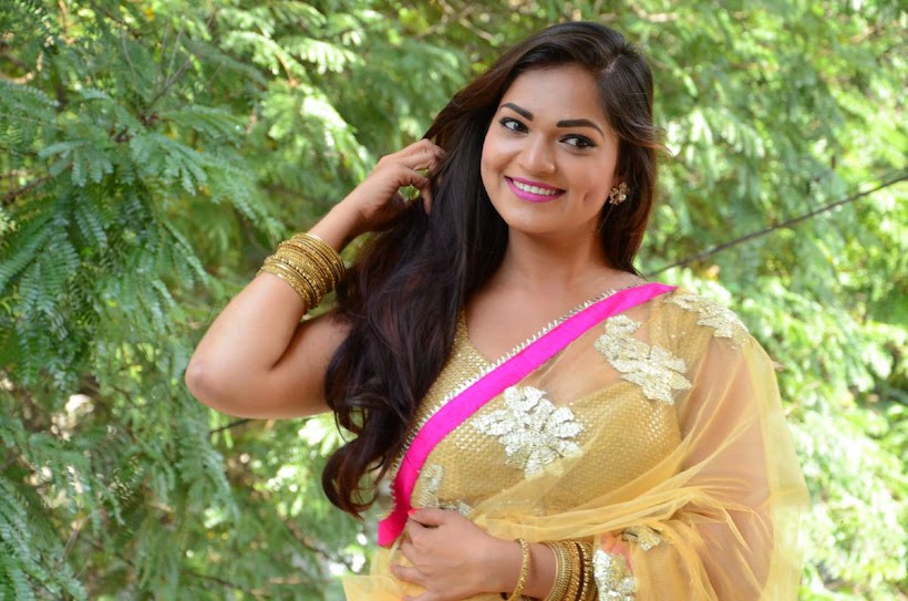 Ashwini Cleavage in Yellow Saree