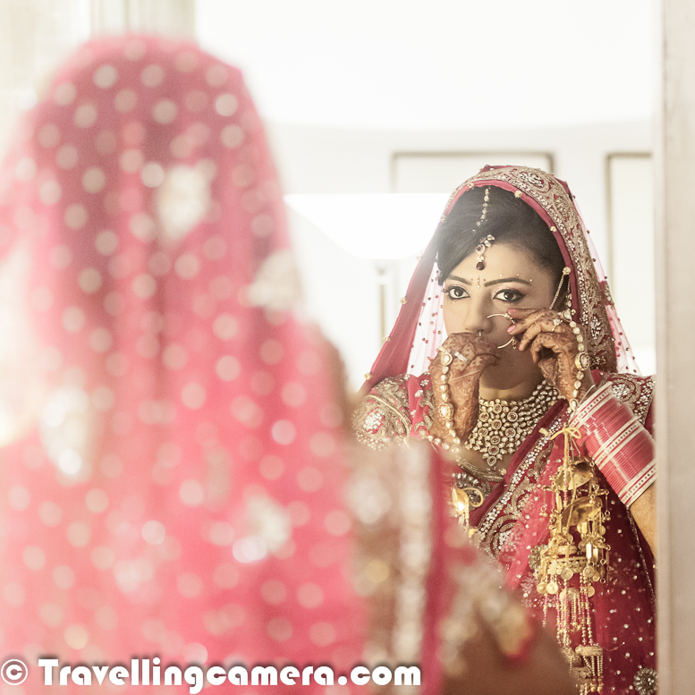 Indian Weddings are quite interesting to photograph and capture these moments to cherish forever. In different states of India, different rituals are associated with regional weddings, but the common part is colorfulness. Let's check out this Photo Journey to check out colorful moments with Indian Bride.. Indian Brides ensure the best dresses for their weddings along with appropriate jewellery and other relevant stuffLehnga-Choli is main dress for Brides in Indian Weddings. Wedding in India is a very special occasion of life and people spend a lot on everything associated. On same lines, if we go online or in markets to search Lehnga-Choli, there would hundreds of types of Lehnga-Choli. I just spent 10 minutes on web and got to about various types like Jodhpuri n all, but I am amazed to categorization on the basis of ceremonies which take place in an Indian Wedding. Like Sangeet Lehnga-Choli, Mehndi Lehnga-Choli, Reception Lehnga-Choli etc..Since there is huge demand for Wedding Appareals in India, there is a huge supply of designer Lehnga-Choli as well. Every city in India has various designers who are only focused around weddings. And these are dresses are not limited to Lehngas only. There are many couples who want to try something different in Indian or western version.The market for Bridal dresses is quite big and at the same time demand for various options in Groom dresses is also increasing quite fast. Sherwanis, Indo-Western Suites etc.. Venues for Indian Weddings are also very special. With time trends are changing but still there is huge demand of different types of places. Usually huge number of friends & relatives join together to celebrate this moment. Still some families celebrate the main ceremony with everyone and at times, invitees are divided into different ceremonies. Venues are arranged accordingly. Usually huge farms are preferred for main ceremony and if someone decides to have lesser number of guests, number of options increase as various good hotels are decent space to host marriages. Trend of Wedding planners is also increasing in India. A wedding planner is a professional who assists with the design, planning and management of a client's wedding. Weddings are significant events in people's lives and as such, couples are often willing to spend considerable sums of money to ensure their wedding is organized as perfectly as possible. Professional wedding planners exist throughout the world, most notably in the USA, UK and Western Europe. There are various wedding planning courses available to those who wish to pursue the career. Wedding planners are often used by couples who work long hours and have little spare time available for sourcing and managing wedding venues and wedding suppliersIndian weddings are filled with ritual and celebration that continue for several days. Generally anywhere between 200 to 5000 people attend. Many of the attendees are unknown to the bride and groom themselves.  The traditional Indian wedding is about two families being brought together socially, with as much emphasis placed on the families coming closer as the married couple. Many wedding customs are common among Hindus, Jains, Sikhs, and even Muslims. They combine local, religious and family traditions. The period of Hindu marriage ceremonies dates from the application (lagan) of tilakIndian weddings are a mainstay in the social calendar of the whole community. Many wedding traditions that originated in India, Pakistan and Bangladesh carried over to immigrant populations. Increasingly, Western features are incorporated, such as speeches, the first dance and the traditional wedding cake. Indian weddings are typically lavish - which costs a lot to the family.A non-Indian guest wondering about the fat Indian Weddings and detailed rituals to be followed for starting a married lifeFamily priest is one of the important person in Indian Marriages, who is required in almost every ceremony related to weddings in India. Some of the common cemermonies in Indian Weddings are -Sangeet, Mehndi, Kanyadaan, Bariksha, Tilak, Lagn, 7 Vachan, fere, Flower bed Ceremony, Vidai etc.professional Indian Wedding Photographer VJ Sharma | Indian Wedding Photography | Top Wedding photographers in Delhi | Couple shoot Photographs | Pre-Wedding Photo shoots | Post Wedding photo Shoots | Candid Wedding photography | Fine Art Wedding Photography