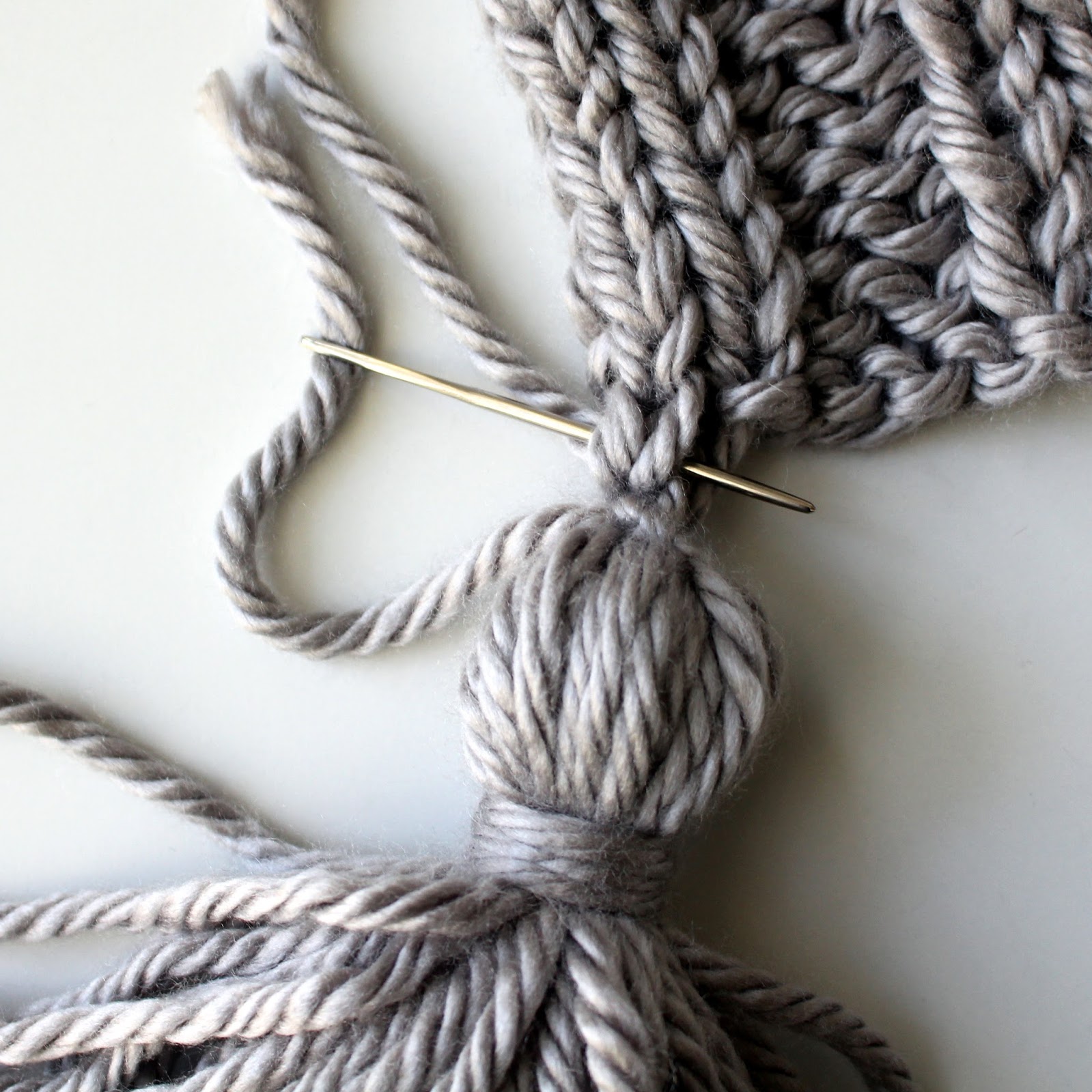 Fifty Four Ten Studio Easy, Modern Tassel Throw Knitting Pattern