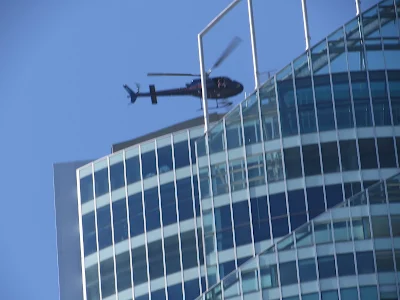 Helicopter over Q1 Tower