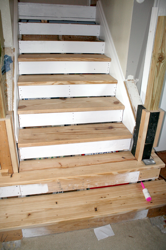 * Remodelaholic * Filling the Gaps Stair Remodel