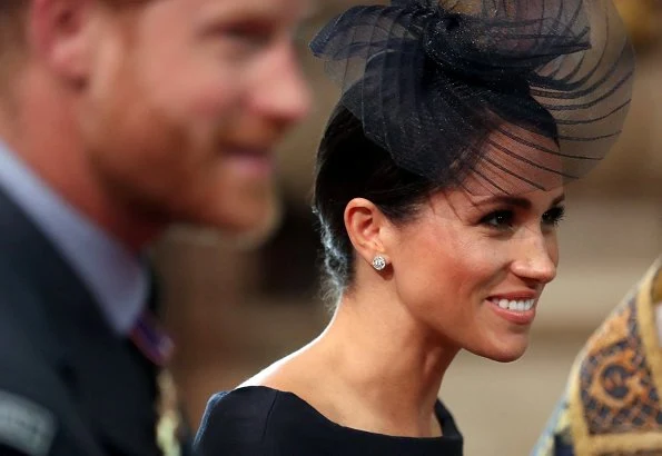 Countess Sophie wore Suzannah Wave Textured Stripe Dress, Meghan Markle wore Dior navy fit and flare dress with bateau neckline. Kate Middleton