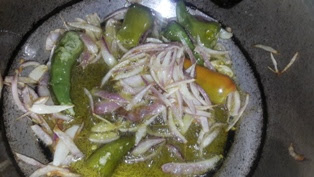Saute onion slices along with green chillies