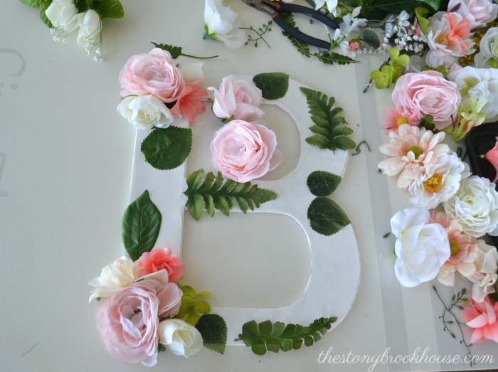 Placing Flowers on Floral Letter