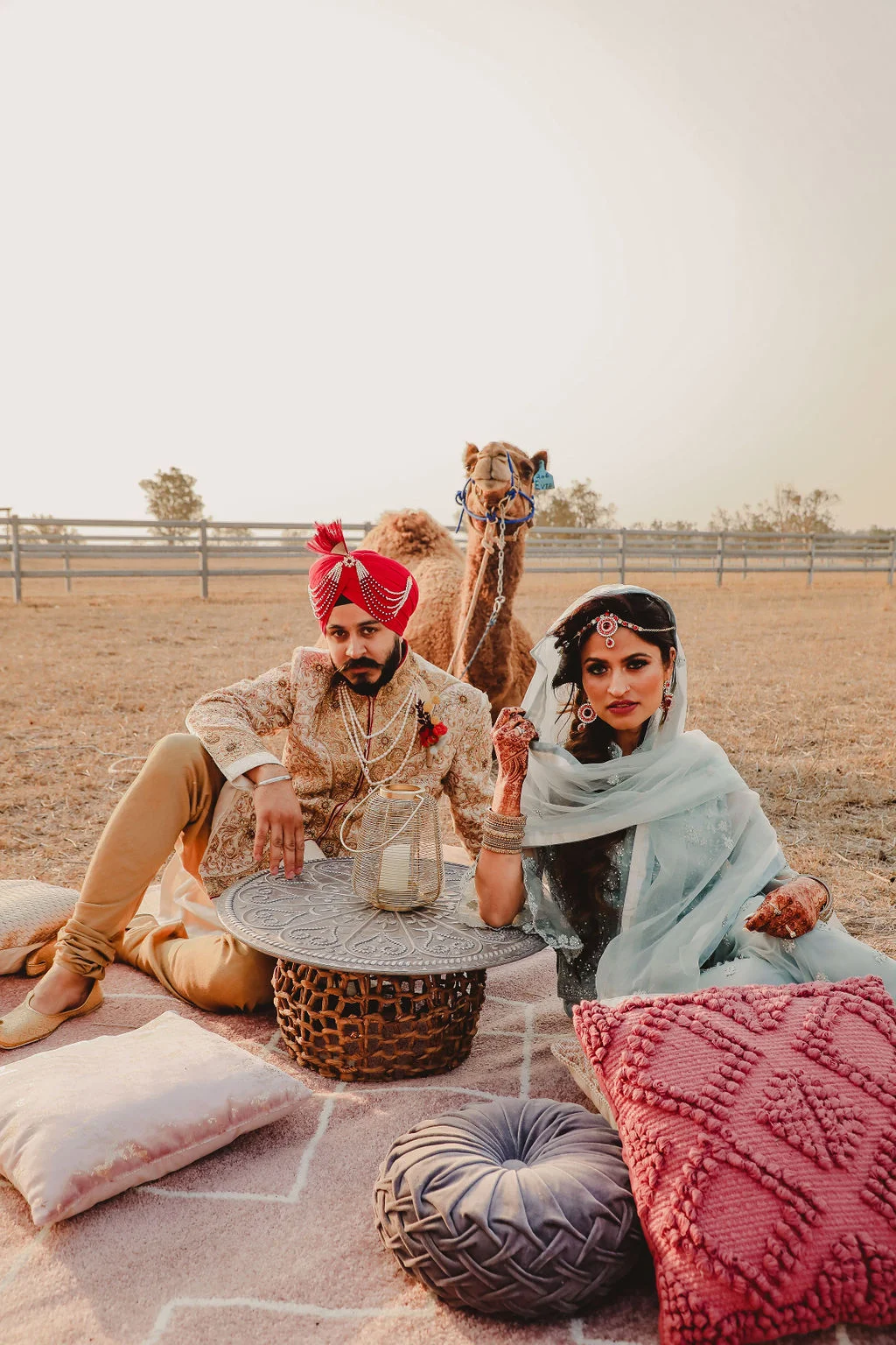 smile darling photography indian weddings Gujarati bride cake floral design outdoor wedding camel red orange decor