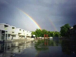 tormenta de verano y arco iris