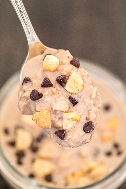Chocolate Peanut Butter Overnight Oatmeal - perfect for breakfast or an afternoon pick-me-up. Loaded with protein! Oatmeal, Greek yogurt, Reese's Coffee Creamer and peanut butter. Stir it all together in a mason jar for easy clean up. Tastes like you are cheating, but you aren't! YUM! #chocolate #peanutbutter #overnightoatmeal Chocolate Peanut Butter Overnight Oatmeal - perfect for breakfast or an afternoon pick-me-up. Loaded with protein! Oatmeal, Greek yogurt, Reese's Coffee Creamer and peanut butter. Stir it all together in a mason jar for easy clean up. Tastes like you are cheating, but you aren't! YUM! #chocolate #peanutbutter #overnightoatmeal
