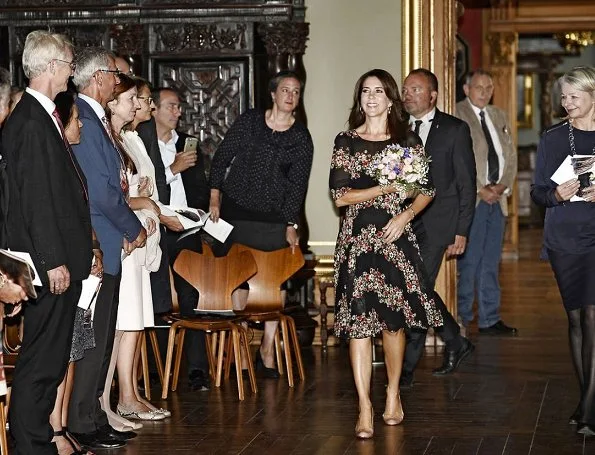 Crown Princess Mary wore Dolce & Gabbana Floral Panel Dress, Naledi Copenhagen Allana Latte Ostrich Clutch, photographer Marco Grop