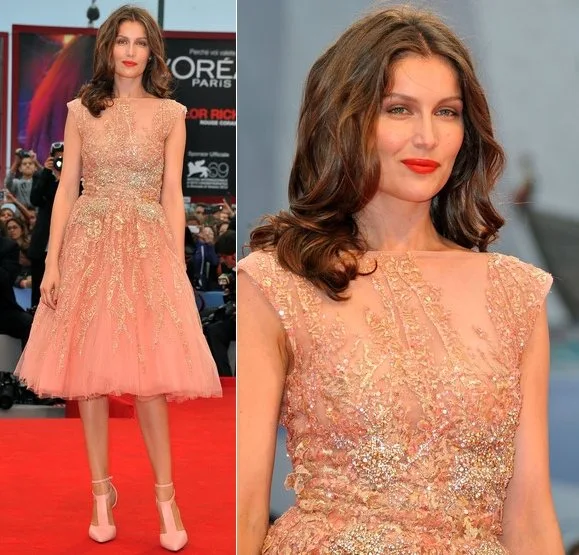 Laetitia Casta wore Elie Saab dress from Fall 2012 Couture collection. Her pretty peach tulle dress with an a-line skirt