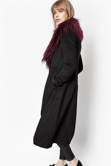 black coat red fur collar