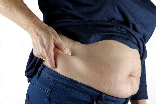 لماذا تتراكم الدهون في البطن