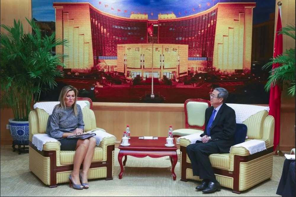Queen Maxima of The Netherlands meets with officials of the Bank of China, in Beijing, China.