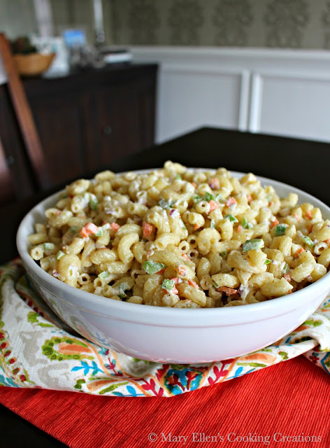A creamy macaroni salad with crunchy veggies. The perfect side for any summer party or barbecue. Elbow noodles, mayonnaise, green pepper, red onion and carrots.