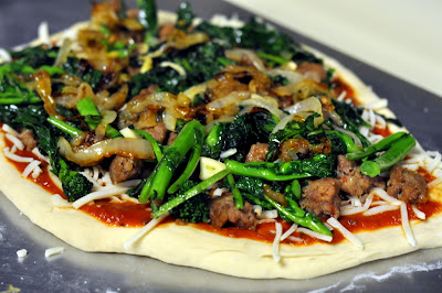 Pizza with Spicy Italian Sausage, Broccoli Rabe, and Caramelized Onions | Taste As You Go