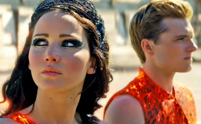 The Hunger Games: Catching Fire (2013) Jennifer Lawrence (left) as Katniss and Josh Hutcherson as Peeta, Directed by Francis Lawrence