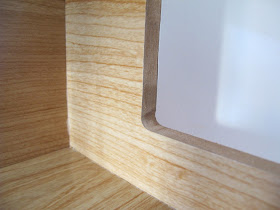 Close up view of the window edges of the modern Lori Loft to Love dolls' house.