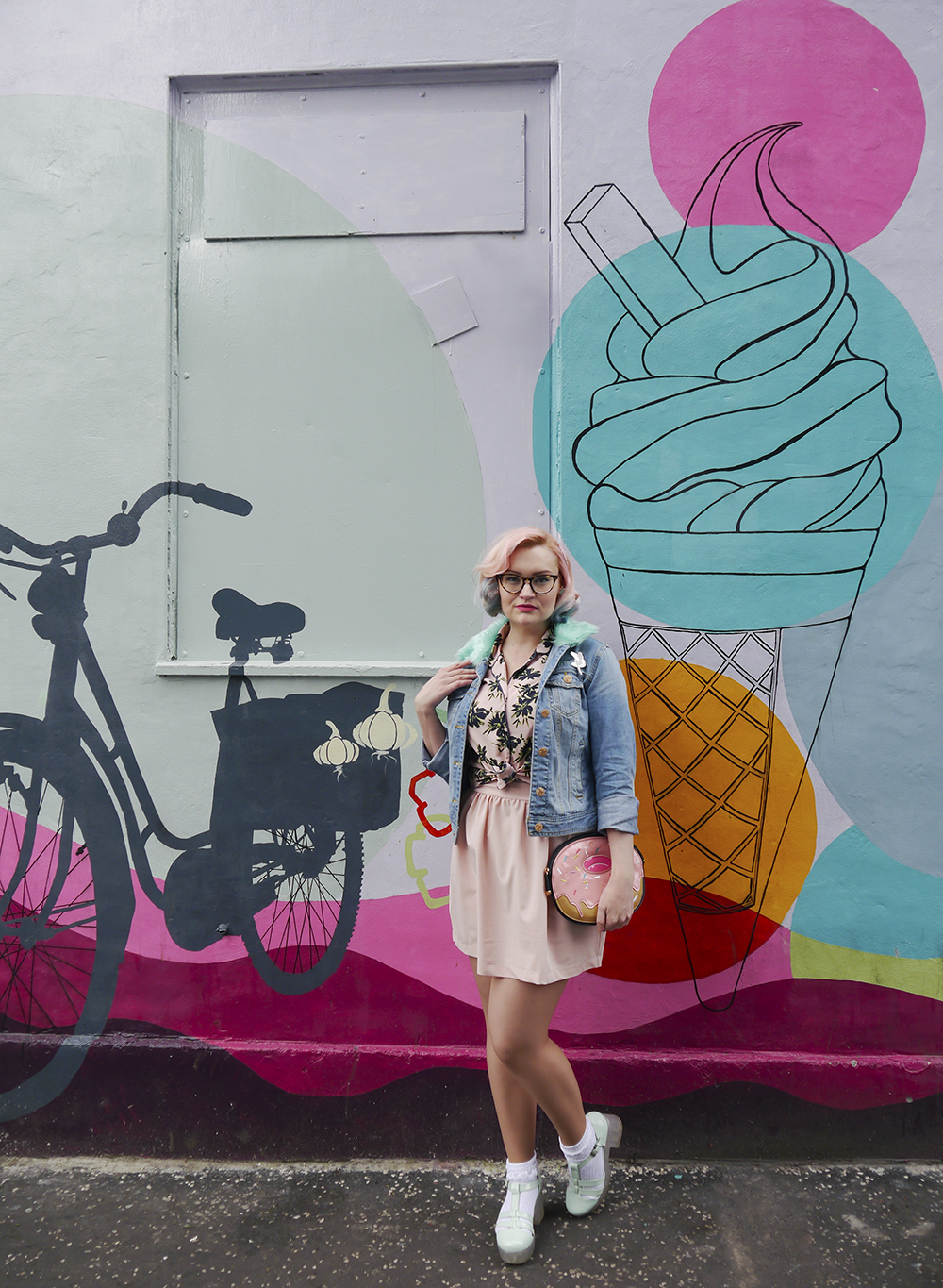 Ice cream parlour retro style with fashion blogger Wardrobe Conversations Scottish fashion blogger Kimberley from Wardrobe Converations wearing a hawaiian style shirt and pink skater skirt in front of a giant icecream painting