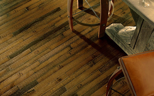 Narrow plank hardwood adds a rustic touch to this floor.