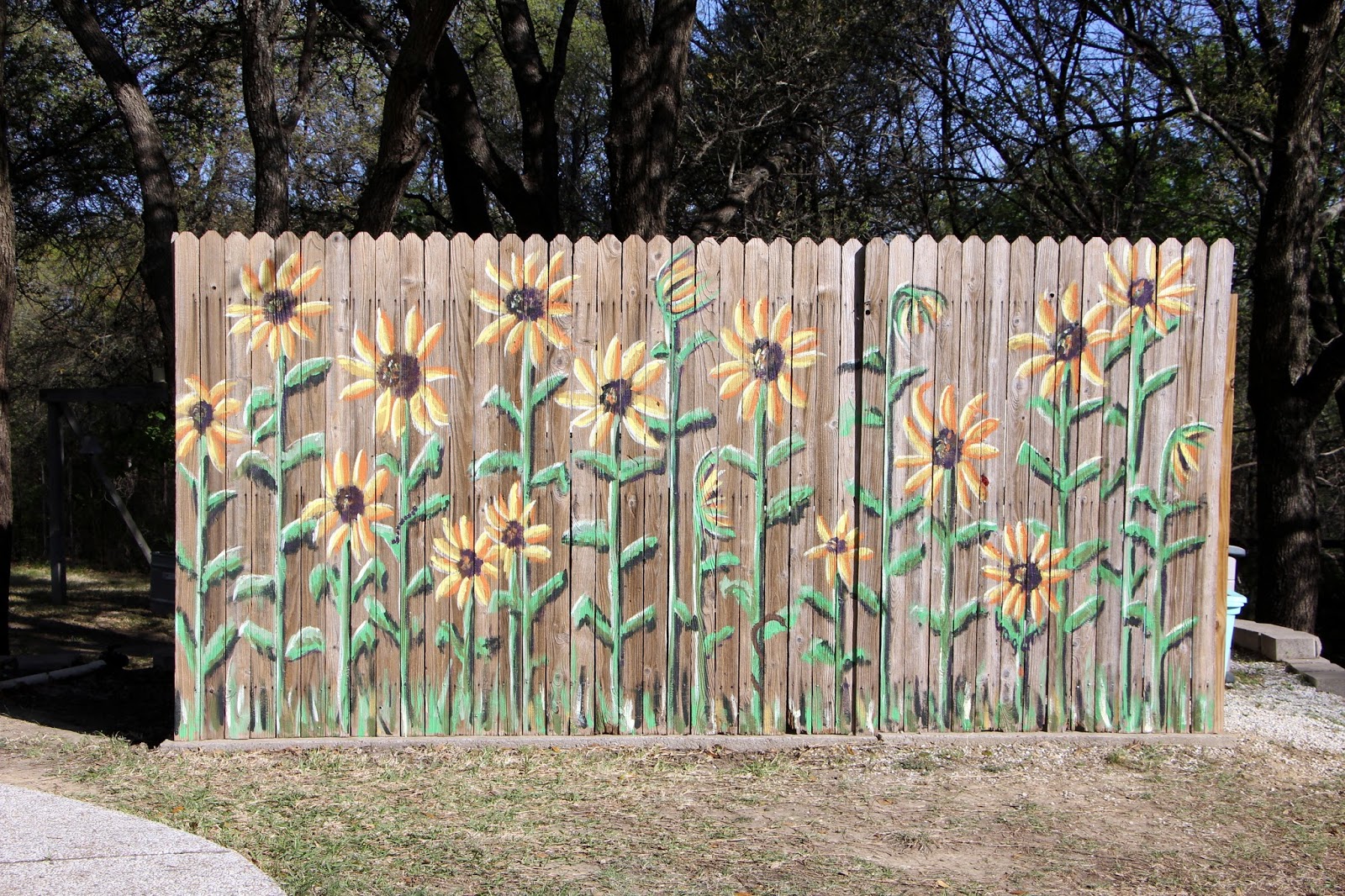 Word Weaver Art Sunflower Mural on Fence
