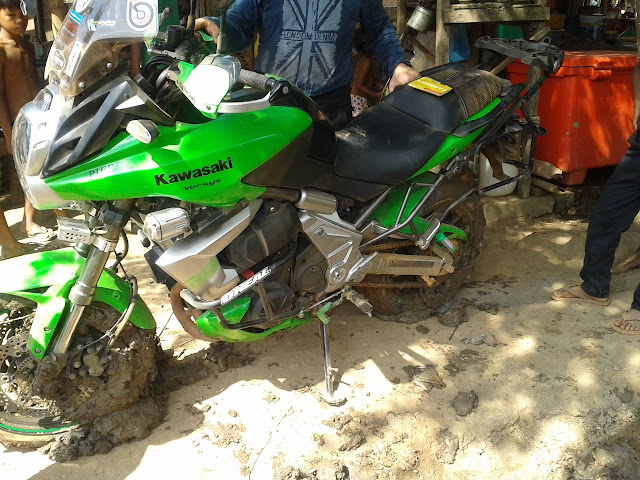 Motorbike in the mud in Cambodia Motorbike riding in Cambodia