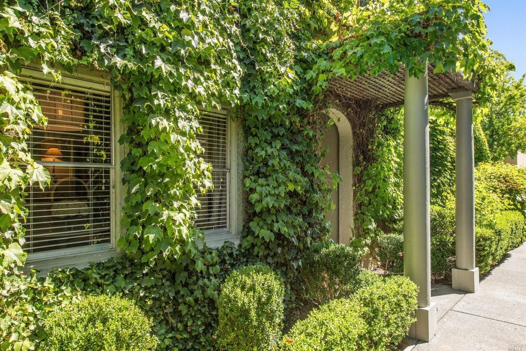Ivy covered California home of Myra Hoefer with lush gardens and French inspired interiors