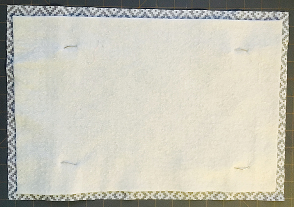 Reversible fabric placemats with coordinating napkins
