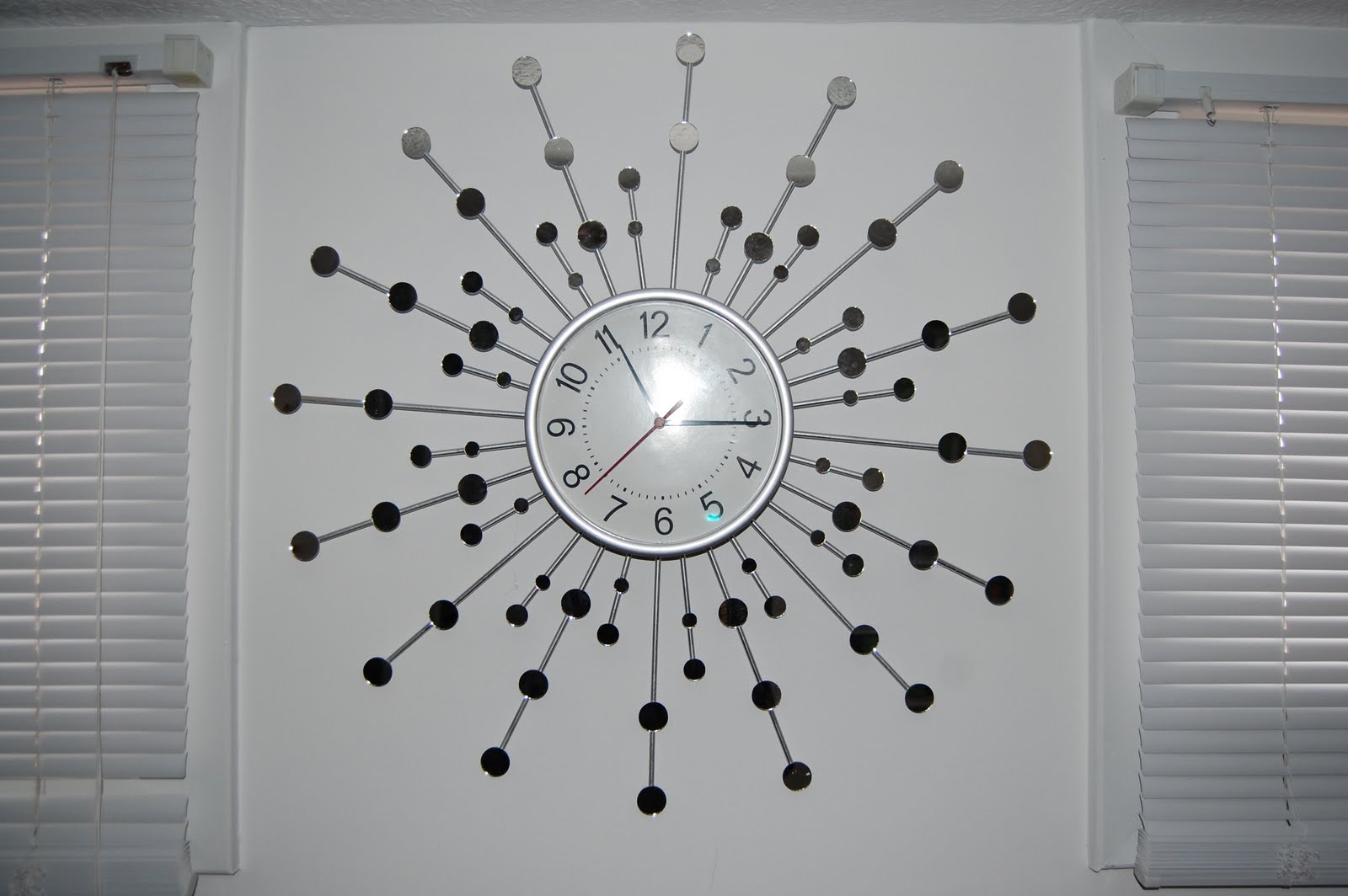 Sharing is Caring Sunburst clock mirror