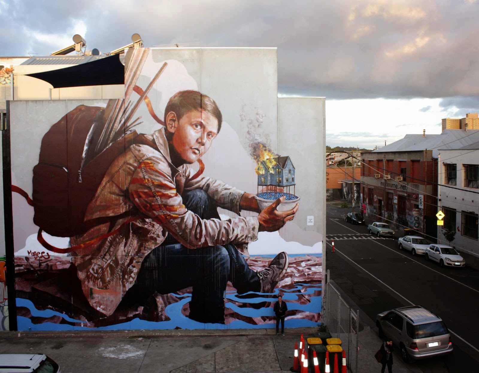 Fintan Magee is currently in Australia where he just wrapped up yet another gigantic mural somewhere in Collingwood, Melbourne.