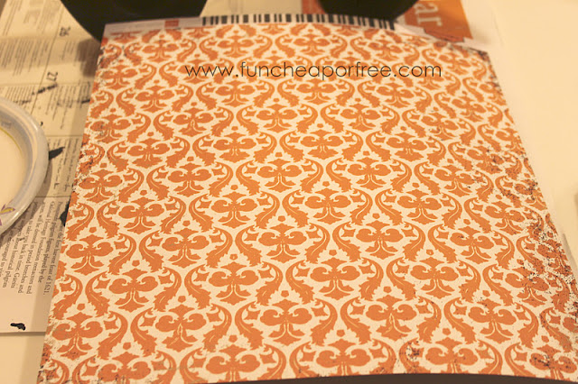 Scrapbook paper on a table, from Fun Cheap or Free