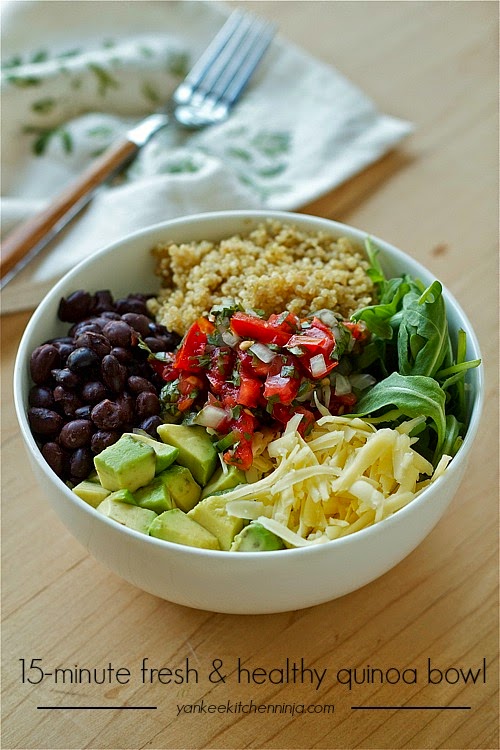 Healthy black bean quinoa bowl with arugula and avocado