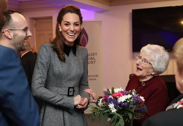 The Duchess wore a dress by Catherine Walker. Kate Middleton wore Catherine Walker dress for the UK's Holocaust Memorial Day Ceremony