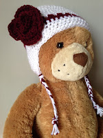 Crocheted winter hat with earflaps