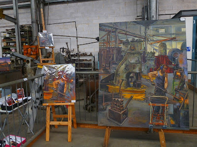 Exhibition of oil paintings in blacksmith's workshop, Eveleigh Railway Workshops painted during ATP Open Day by industrial heritage artist Jane Bennett