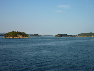 Small islands in Seto inland sea taken from a ferry travelling from Naoshima (Miyanoura) to Uno