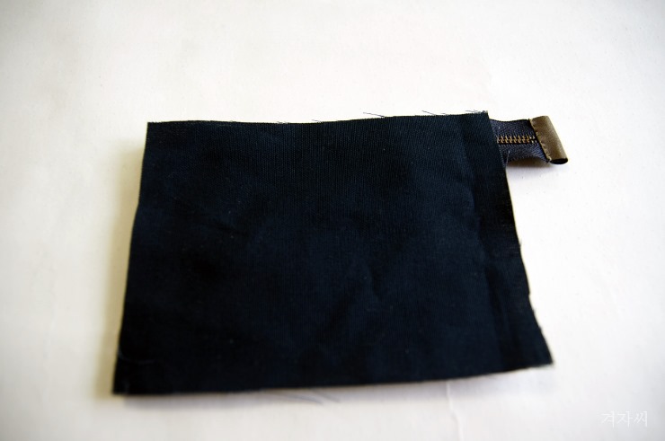Small cosmetic pouch made of faux fur makeup bag mini wallet.