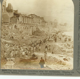 Rescuers dig through the rubble in Messina 