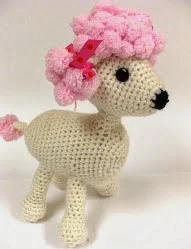 http://www.ravelry.com/patterns/library/pomp-a-puppy