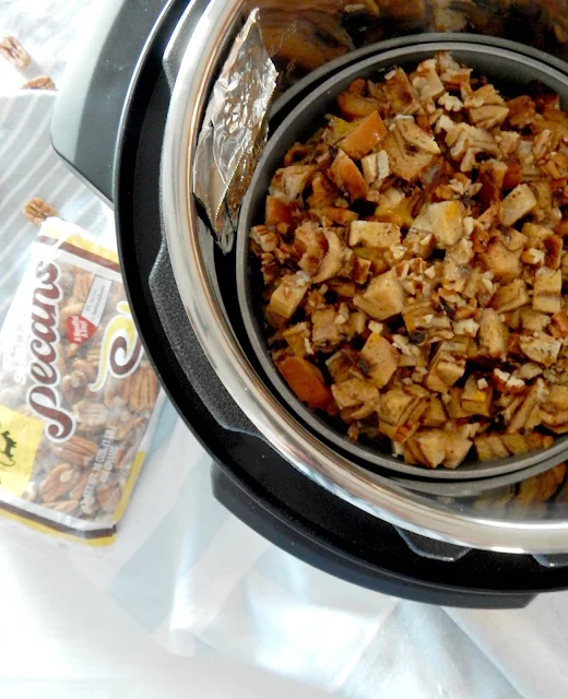 Instant Pot Cinnamon Roll French Toast...this easy start-to-finish 30 minute version is delicious!  Cinnamon swirl bread, an egg custard, chopped pecans, maple syrup...it's the best easy, home baked breakfast! (sweetandsavoryfood.com)