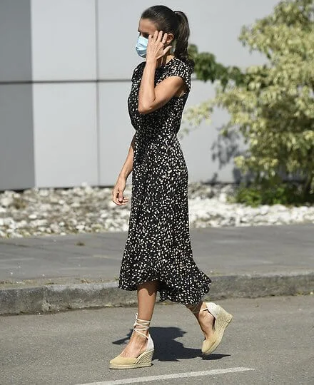 Queen Letizia wore a polka-dot print dress from Massimo Dutti, and suede espadrille wedges from Mint and Rose. Cantabrian Sea, Bay of Biscay