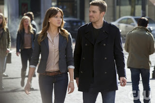 Stephen Amell and Katie Cassidy as Oliver Queen and Laurel Lance Arrow Pilot Episode