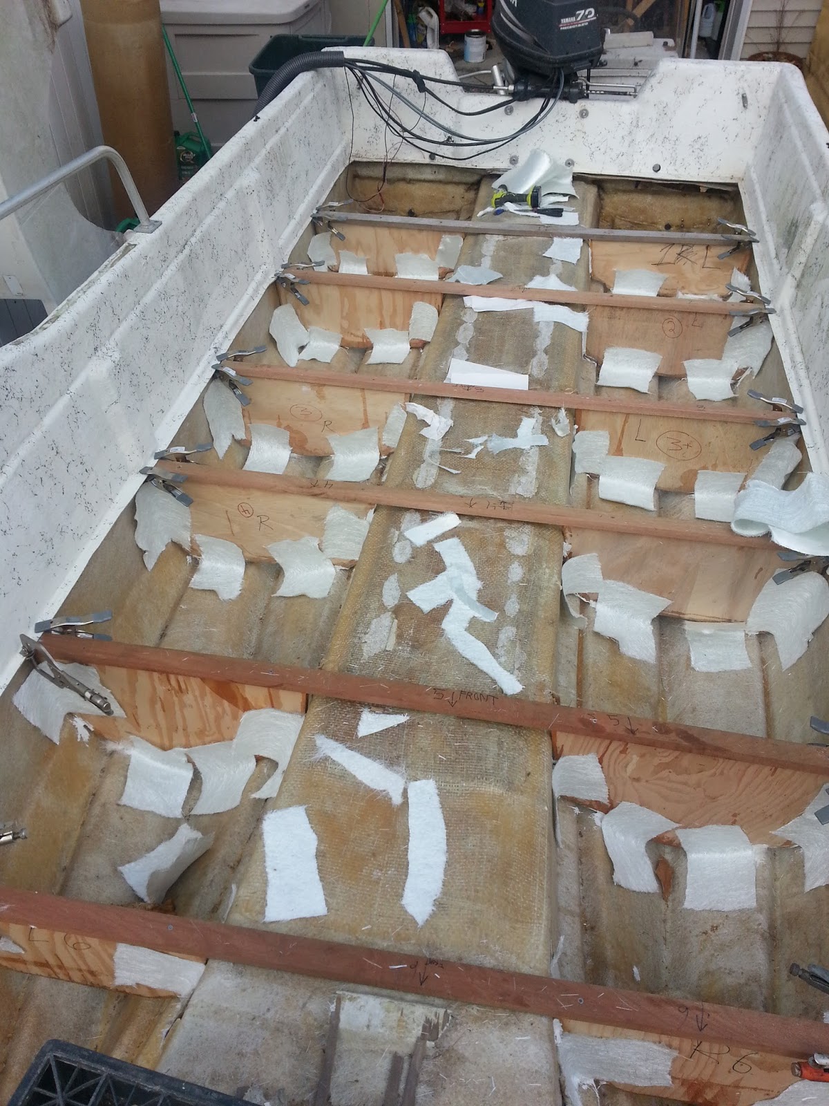 Repairing a deck on a fiberglass boat Seagull Nautico 18 Cutting tabs.