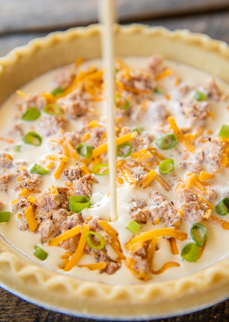 Mississippi Sin Quiche - all the flavors of our favorite dip in a quiche! Can make ahead and refrigerate or freeze for later. Ham, cream cheese, cheddar cheese, worcestershire sauce, green onion, hot sauce, sour cream, eggs, milk, pie crust. Everyone LOVED this delicious quiche!! I always double the recipe because this doesn't last long. SO good! #quiche #mississippisin #ham #breakfast #freezermeal Mississippi Sin Quiche - all the flavors of our favorite dip in a quiche! Can make ahead and refrigerate or freeze for later. Ham, cream cheese, cheddar cheese, worcestershire sauce, green onion, hot sauce, sour cream, eggs, milk, pie crust. Everyone LOVED this delicious quiche!! I always double the recipe because this doesn't last long. SO good! #quiche #mississippisin #ham #breakfast #freezermeal